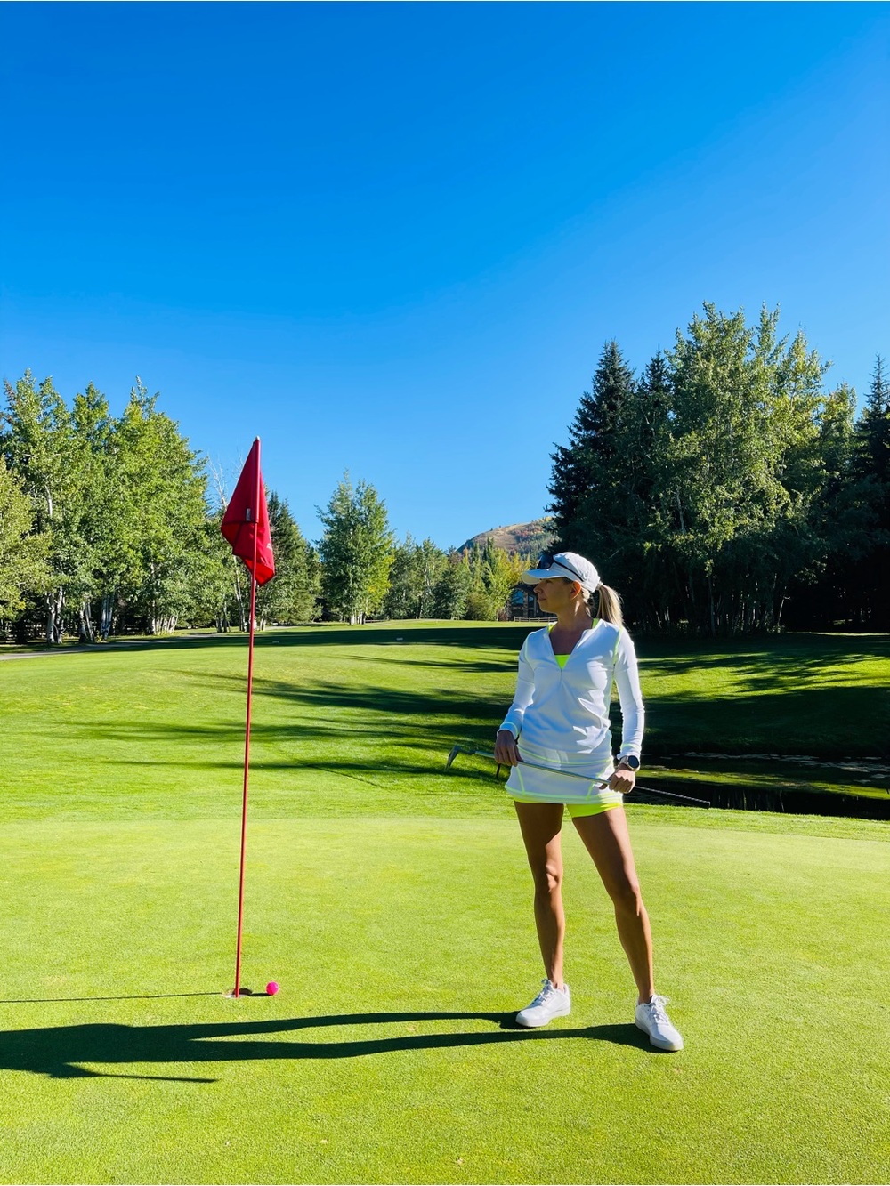 Women’s White Golf Skort with Neon Yellow Accents